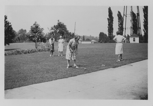 7.10.8: Students playing croquet, Summer 1938