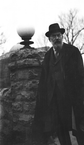 3.10.13: Irish poet AE beside the stone wall at Radford, April 1931
