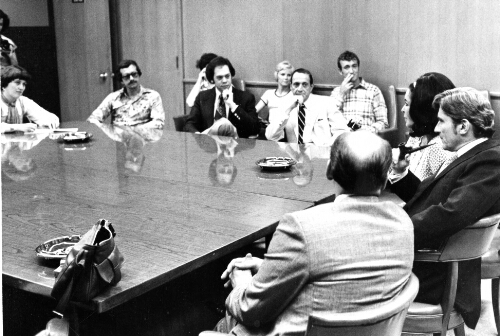 6.8.8: Elizabeth Taylor, John Warner, and Radford  President Donald Dedmon in President's board room