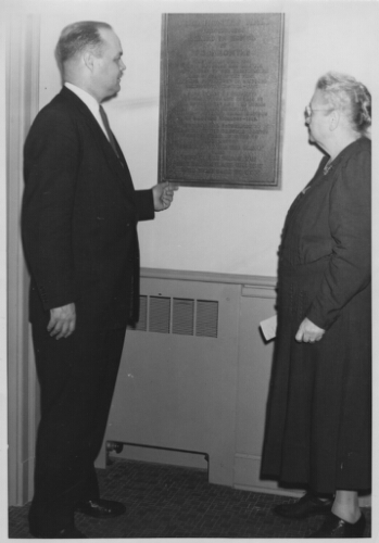 6.4.48: President Charles Martin and Dean M'Ledge Moffett inspect plaque in Pocahontas Hall