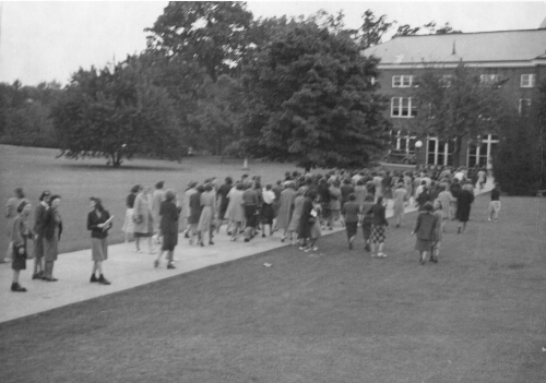 1.31.9: Freshman return from Library where they took psychological tests, Fall 1938
