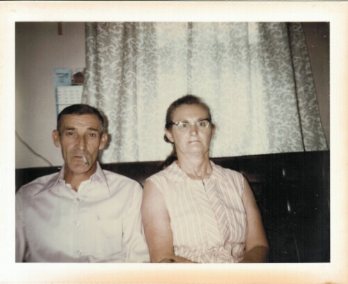 Harley Cordle in his living room with his wife Sally Ann Stillwell Cordle