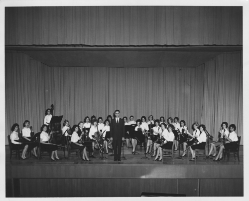 The 29-member Radford College chamber orchestra, directed by Dr. Charles Wunderlich, is unique in Southwest Virginia. It is one of the showcase products of the expanding music program at Radford. - caption with the photo