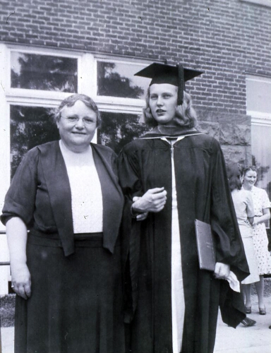 M'Ledge Moffett and a graduating student