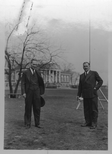 2.34.1: President Peters (left) with McConnell Library in the background