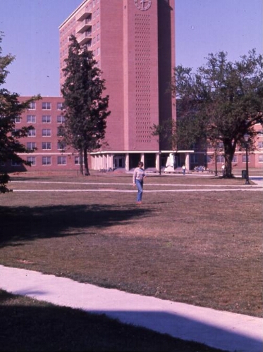Unidentified student in front of Muse Hall.