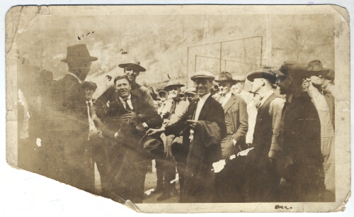 From inscription on back of photo identifying the people numbered: "1. Col. Lilly, 2. a member of (illegible), 3. Blizzard of coal miners organization at (illegible) for a meeting."