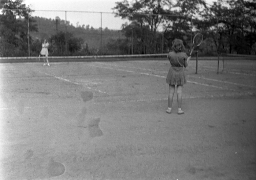 7.12.4-6: Unidentified students playing tennis on the Radford College Campus, 1940s