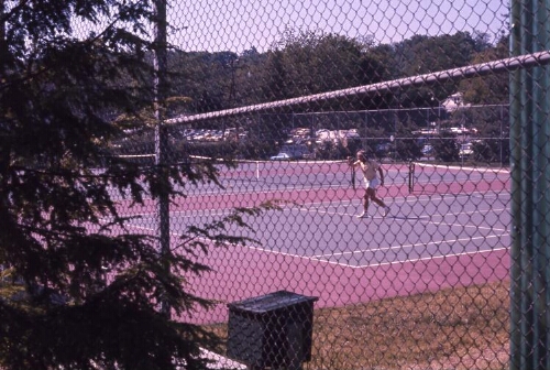 Man on tennis court.