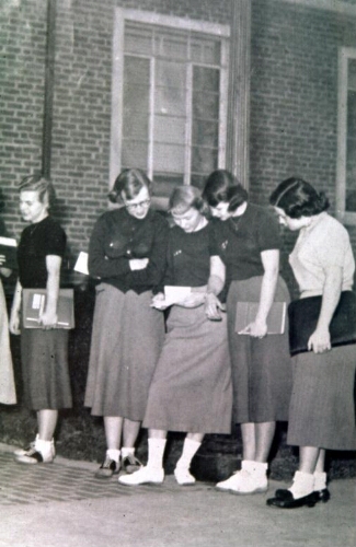 Unidentified women waiting in line.