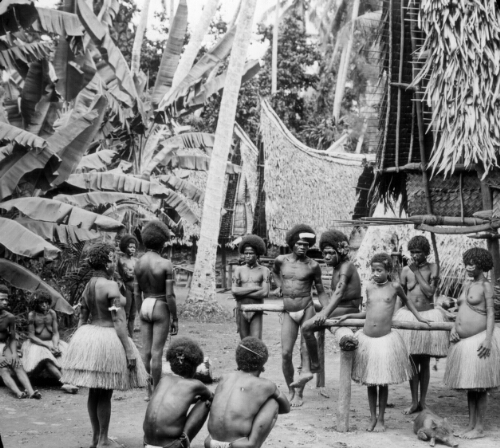 In a Papuan Village, New Guinea