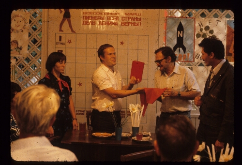 Young Pioneer Camp Leader Presents Gift to U.S. Coal Miner Group Leader ('79) Bob Havens (glasses), Near Kharkov, USSR