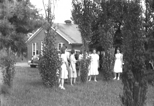 7.12.4-1: Unidentified students on Radford College Campus, 1940s